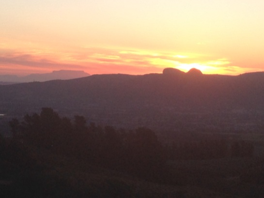 Sun setting behind Paarl Rock